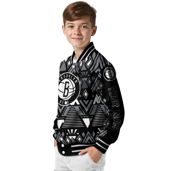 customized brooklyn nets pyramid shapes black varsity jacket trendy.webp