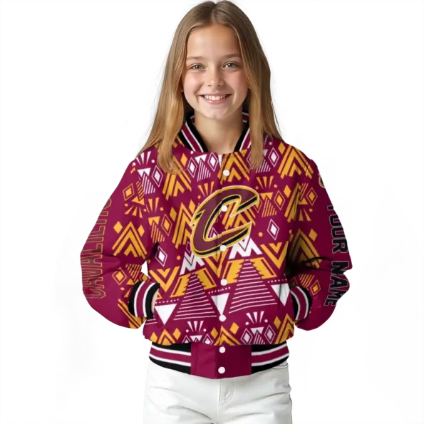 customized cleveland cavaliers pyramid shapes wine varsity jacket top rated.webp