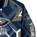 customized new orleans pelicans chevron angles navy varsity jacket best selling.webp