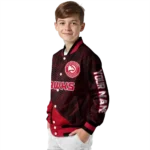 personalized atlanta hawks hexagon mesh red black varsity jacket best selling.webp
