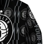 personalized brooklyn nets bolt stripe black varsity jacket best selling.webp