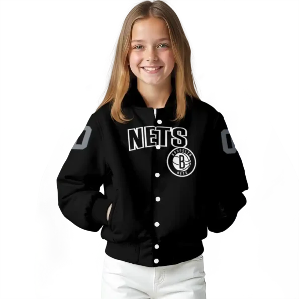 personalized brooklyn nets flame border black varsity jacket top rated.webp