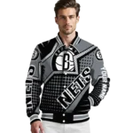 personalized brooklyn nets star burst black varsity jacket best selling.webp