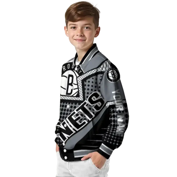 personalized brooklyn nets star burst black varsity jacket trendy.webp