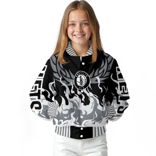 personalized brooklyn nets winged blaze black white varsity jacket top rated.webp