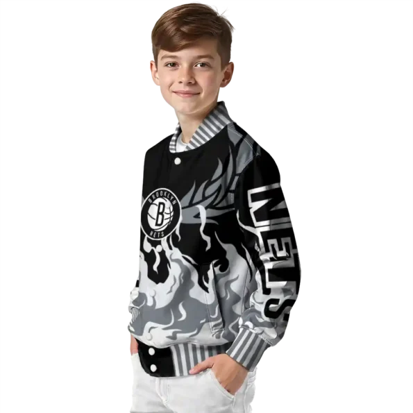personalized brooklyn nets winged blaze black white varsity jacket trendy.webp