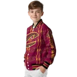 personalized cleveland cavaliers bolt stripe wine varsity jacket best selling.webp