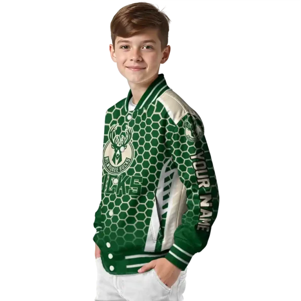 personalized milwaukee bucks hexagon grid green varsity jacket trendy.webp
