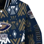 personalized new orleans pelicans pyramid shapes navy varsity jacket best selling.webp