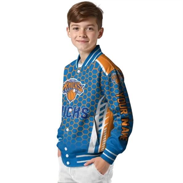 personalized new york knicks hexagon grid blue varsity jacket trendy.webp