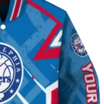 personalized philadelphia 76ers chevron angles blue varsity jacket best selling.webp