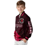 personalized toronto raptors hexagon mesh red black varsity jacket best selling.webp
