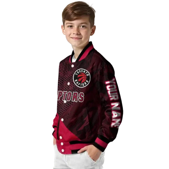 personalized toronto raptors hexagon mesh red black varsity jacket trendy.webp